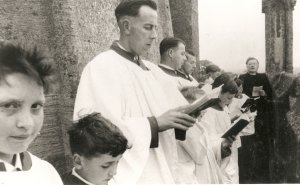 All Saints Church Choir Coronation Day June 2nd 1953. They are singing from the top of the Church tower (known as the Hollis) at 6 in the morning. Adults left to right are Stan Newman, David Gibbard, Howard Gibbard & Rev Glyn Jones. Boys are ? Markham extreme left and Brent Harris behind the hymn book